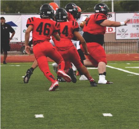 The Grants High School football team played the 4th ranked Moriarty Pintos (4-0) this past weekend on the road and lost 21-13. The Pirates (1-3) will play the 2-2 Hope Huskies this Saturday in an away game. In this file photo the GHS defense is in action in a home game Franklin Romero - CC