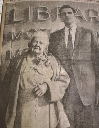 Mother Whiteside stands with mining executive and philanthropist Vernon Taylor in front of the newly dedicated Mother Whiteside Municipal Library in 1954. The building’s creation was made possible by a donation from Taylor and decades of grassroots work by the women of the Pilot Club. Courtesy Photo