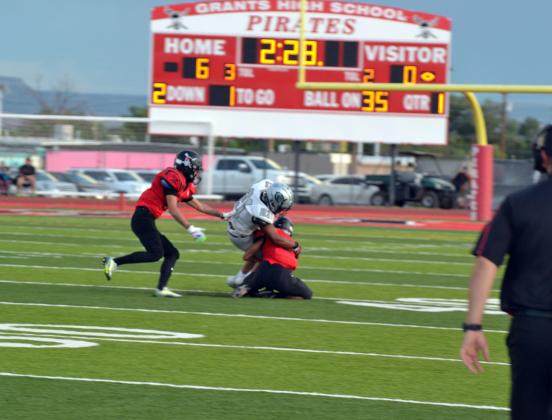 Pirate Knight Long (1) is photographed performing a tackle this past Friday in the Pirate’s home opener against the Capital Jaguars. Despite leading 17-13 in the first half the Pirates lost 33-17. Next up for the Pirates will be the Gallup Bengals (0-1) on Saturday, August 26 at 3 p.m. at the Port of the Pirates in the 2023 homecoming game. Franklin Romero - CC