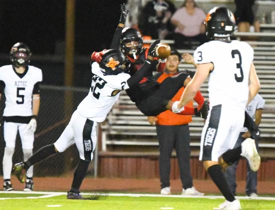 Boudy Melonas charges forward as the Grants Pirates bench erupts in support during a highlight moment from the 2023– 24 football season. GHS earned a 7th seed in the 4A State Playoffs this year, capping off a competitive and hard-fought campaign. As the academic year closes, the Pirates thank their fans for a season of strong support at the Port of the Pirates. Franklin Romero - CC
