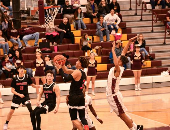 Senior Boudy Melonas (3) sinks a shot during a home game earlier this season, part of a standout campaign that culminated in a rare milestone. Melonas scored his 1,000th career point during the district matchup at Belen last Saturday—a remarkable achievement reflecting four years of consistent leadership and scoring excellence for the Pirates. Congratulations, Boudy!