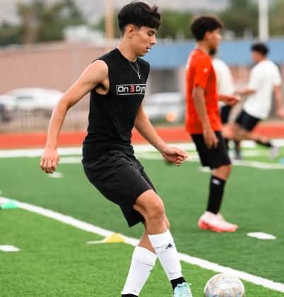 Franklin Romero - CC In this file photo, senior center midfielder Fabian Peña showcases his footwork during tryouts ahead of the 2023 season. Peña, who earned All-District Second Team honors, was a key playmaker for the Pirates and helped anchor a competitive campaign on the pitch. Now graduated, Peña leaves behind a legacy of leadership and hustle as Grants High School wraps another strong year of boys soccer.