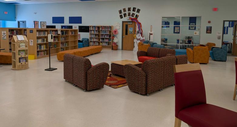 The welcoming interior of the Grants Public Library offers comfortable seating, access to thousands of books, and a vibrant Maker Space for creative exploration.. Amerika Rougemont - CC