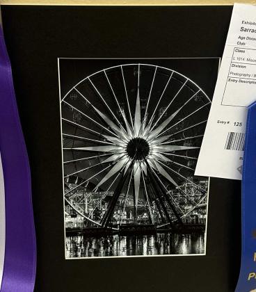 Troy Sarracino earned a Grand Award and first-place ribbon for this black-and-white photograph of a Ferris wheel displayed in the exhibit hall at the 57th Annual Bi-County Fair. Diego Lopez - CC