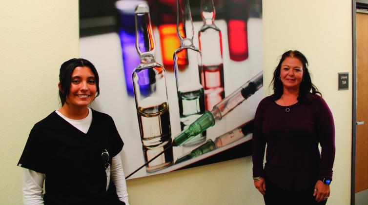 Phlebotomy student Abriyah Urioste, and instructor Amanda Darling take a break from phlebotomy clinicals. Courtesy of NMSU