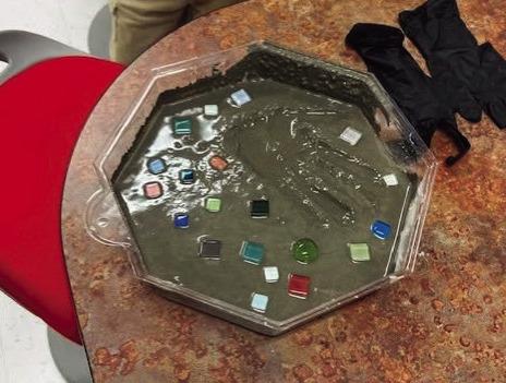 Wildflower Circle participants created decorative stepping stones at the Grants Public Library on Oct. 7, using colorful pieces to design their own finished stones. Courtesy Photo