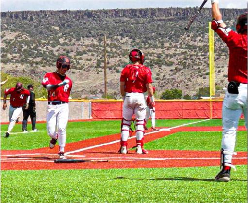 The Pirate baseball team has advanced in the state tournament from the first round to the quarterfinals after defeating the Portales Rams in two games, 4-3 and 13-3, in a best of three series. The Pirates will play the Bernalillo Spartans in the quarter finals on Thursday, May 16 in Albuquerque. In this photo, Izeyah Manzanares, 24, scores a run for the Pirates. Franklin Romero - CC