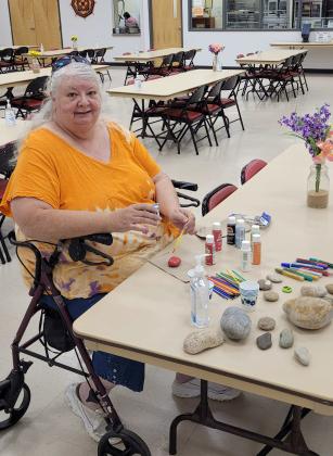Susan works on painting her rock as a ladybug at the Cibola County Senior Center. Several events take place every week along with daily activities such as puzzles and 8-ball pool. The senior center also gives access to a library, exercise machines, and computers. Nathan Chavez - CC