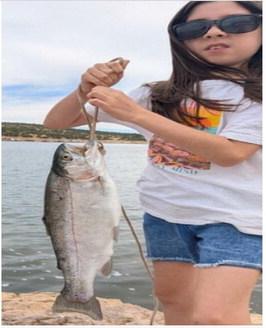 Victoria Parra, age 10, of Las Cruces, caught a 21-inch rainbow trout on May 24 Courtesy Photo