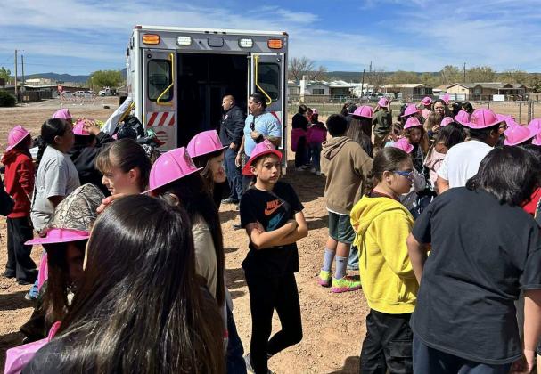 Mesa View Elementary students got an unforgettable lesson in real-world safety and emergency services as Grants Fire and Rescue teamed up with the PHI Air Medical team for a surprise visit. Fourth, fifth, and sixth graders explored emergency vehicles, met real-life heroes, and even witnessed a helicopter landing on the school grounds. Students sported pink firefighter helmets and asked questions about careers in public safety. Courtesy Photo