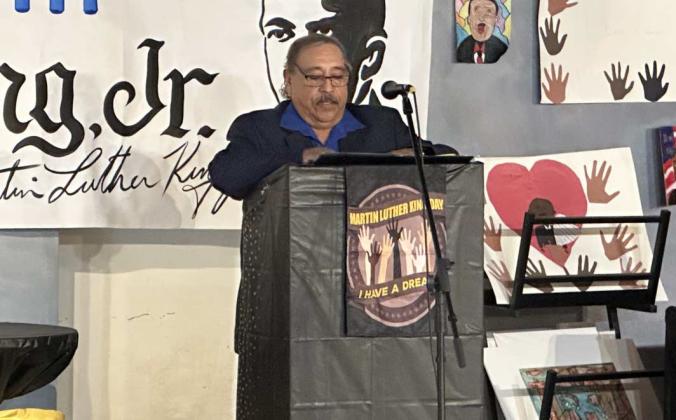 Village of Milan Mayor Felix Gonzales addresses the crowd at the 20th Annual Dr. Martin Luther King Jr. Celebration at the Double Six Arts Gallery in Grants on Monday, Jan. 19, 2026, reminding attendees it is “a day on, not a day off.” Diego Lopez - CC