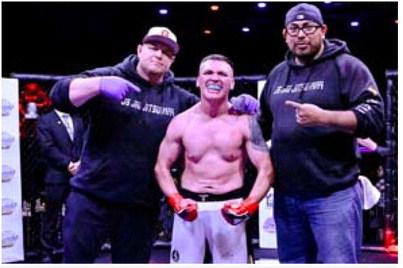 Dion Valdez fighting at 145lbs. poses with his trainer/coach Joey Jujan (L) and cornerman Anthony DeVargas at Fightworld42 at Revel Entertainment this past Saturday. Franklin Romero - CC
