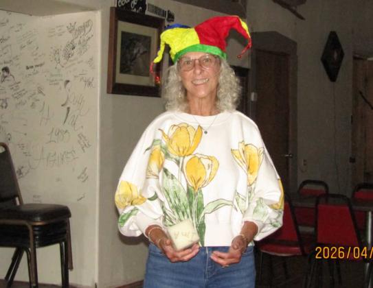 Photo by Roger Siegmann June Kershner proudly receives her Car Fool crown