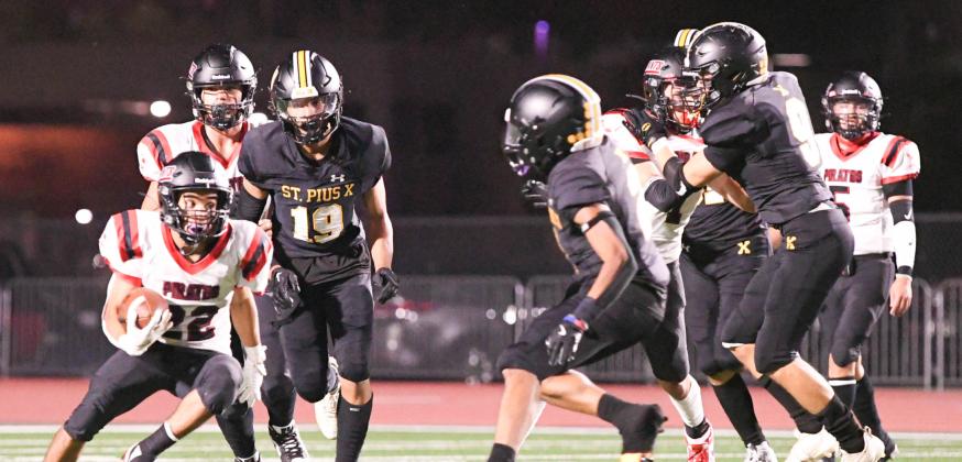 Running back Andres Lazos,22, a senior, with a carry this past week against St. Pius defense. Lazos was held to 67 yards with 12 carries in that game. Franklin Romero - CC