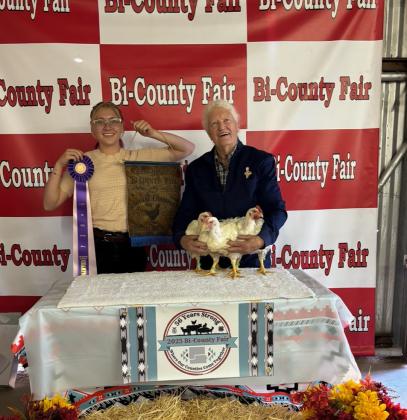 Edea Graham with the Reserve Grand Champion Broiler Meat Pen. Courtesy Photo