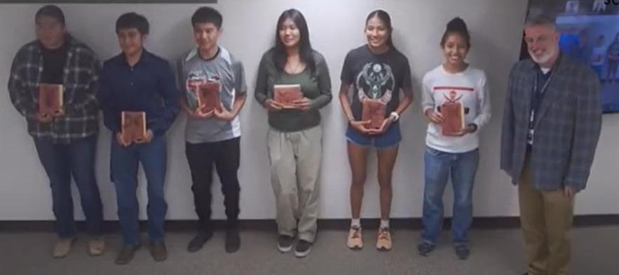 Grants-Cibola County Schools Superintendent Lane Widner stands alongside Grants High School athletes who were recognized at the June 3 school board meeting for their outstanding performances at the state track and field championships. Courtesy Photo