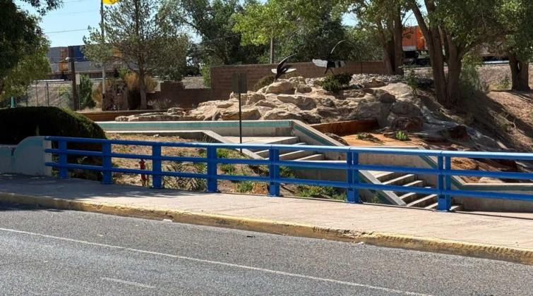 Newly painted blue railings frame River Walk Park, part of Grants MainStreet’s ongoing revitalization work. Courtesy Photos