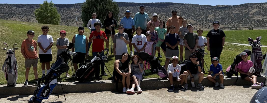 Young golfers gather at the Coyote Del Malpais Golf Course in Grants for the annual Kids 4 Golf Clinic, hosted by staff and volunteers to teach the fundamentals of the game and share a love of the sport.
