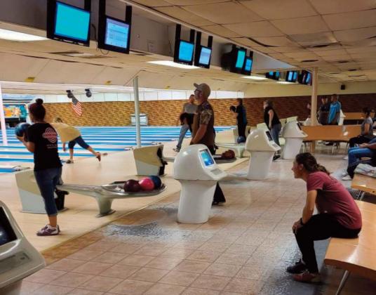 League bowlers delighting in a safe night of fun and bowling for a good cause at Thunderbird Lanes, located on 300 Jefferson Ave, Grants. Kylie Garcia - CC