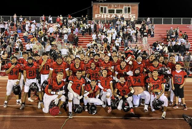 The Grants High School Pirates football team was victorious in the first game of the season and had a solid win against the Miymura Patriots by a score of 34-20. They will play St. Pius on the road this Thursday at 7 p.m. In this photo, the GHSH football team poses after their win. Franklin Romero - CC