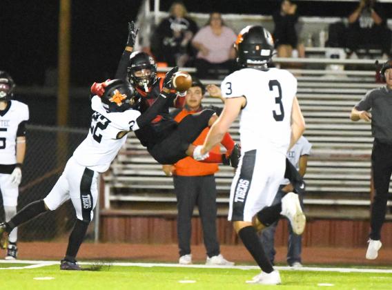 The Grants High School Pirates have earned a seventh seed to the Nusenda Credit Union 4A state football playoffs. They will host the 10th seeded Silver Colts on Saturday, November 9 at 1 pm at the Port of the Pirates. The Pirates ask fans to wear red and to fill the seats early. 'This is a big game for us,' said GHS head football Coach Steve Brown. In this file photo Boudy Melonas battles for a catch with a recent opponent.