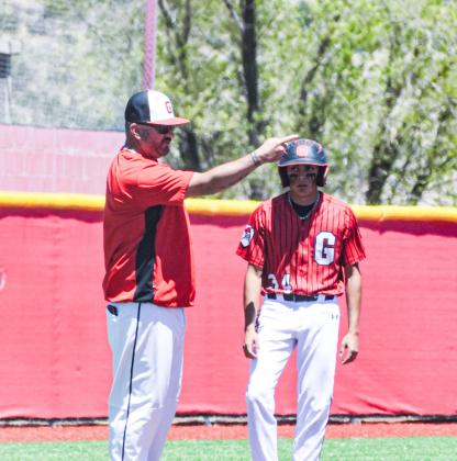 Grants High School’s Mike Furbee coaches it up at third plate at a recent game against Santa Teresa on the first round of 4A baseball playoffs. The Pirates defeated Santa Teresa two out of three games to advance to the quarterfinals in Albuquerque this Thursday where they will play Saint Pius. Franklin Romero - CC
