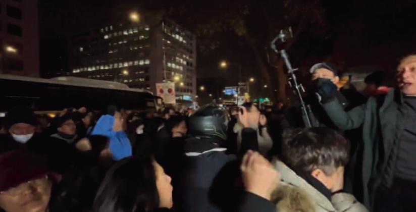 In this courtesy photo captured at the scene of pro-Democracy protests outside the parliament building in Seoul, citizens are seen rallying to defend their nation and right to live with Freedom. PHOTO – Courtesy