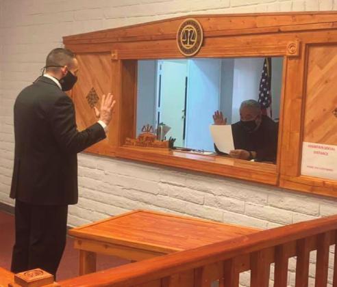 Carl Ustupski takes the Oath of Office on Feb. 17 at the Village of Milan Municipal Court. Village of Milan courtesy photo