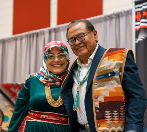 Dr. Elmer J. Guy posing with Dr. Wafa Hozien, Dean of Graduate and Dine’ Studies. Courtesy Photo