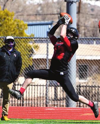 Senior Dominic Martinez, 83, with a spectacular catch this past Saturday as the GHS Pirates hosted the Kirtland Central Broncos. The Pirates defeated the Broncos 50-0. Franklin Romero. - CC