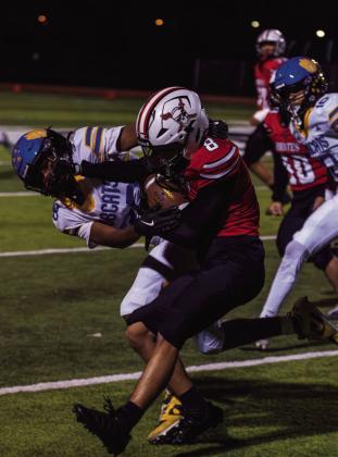 Grants High School sophomore Julian "JuJu" Fernandez carries the football while attempting to escape a Bloomfield defender during a home game at GHS on October 16, 2026. Jay Langford- Student Journalist