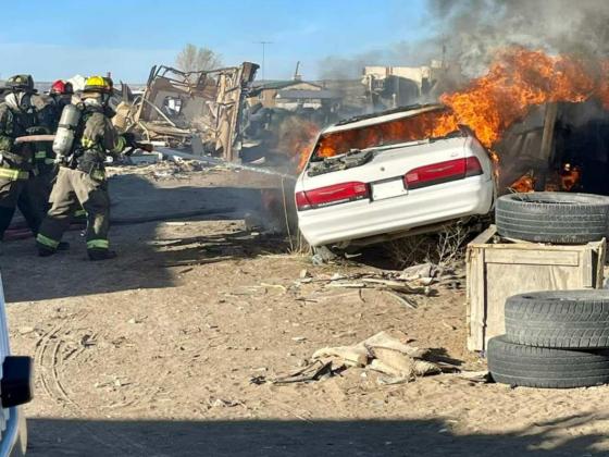 A fire just outside the Village of Milan on April 14 threatened to create a large blaze. Thanks to the quick reaction by Cibola's firefighters the fire was not allowed to grow larger. Courtesy Photo