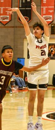Senior Matthew 'Matty' Trujillo, 21, of the GHS Pirates boys basketball team takes a shot at a recent tournament in Gallup. The Pirates are 9-9 overall and 1-1 in district play after a recent 1 point loss on the road to the number 1 team in 4A and district rival, the St. Pius Sartans. Franklin Romero - CC