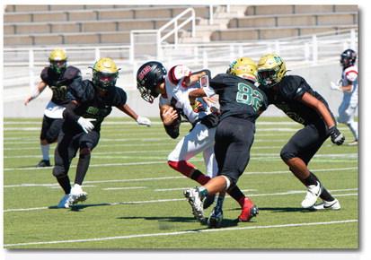 Pirate senior Julian Padilla (5) with some yardage last week against the Hope Huskies (2-3) at Nusenda Stadium in Albuquerque. The Pirates football team is currently 2-3 after a 25-18 win over the Huskies last Saturday. They will travel this Friday to Kirtland Central to take on the Broncos. Franklin Romero - CC