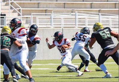 Pirates Take the Bark out of the Huskies, 35-18