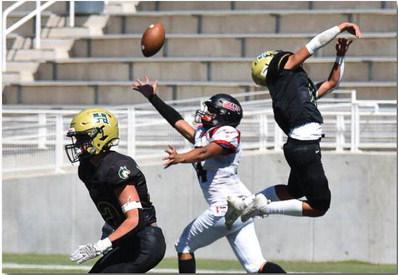 Pirates Take the Bark out of the Huskies, 35-18