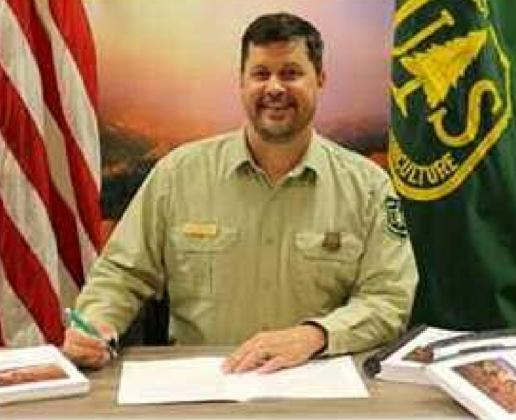 Forest Supervisor Steve Hattenbach signs Record of Decision for the new Cibola National Forest Land Management Plan Courtesy Photo