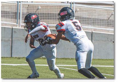 The Pirates are on a 2-0 winning streak after defeating the Kirtland Central Broncos 54-42 in an away game last week. The Pirates improved to 3-3 and will have a bye week this week. In this file photo Julian Padilla (5) hands off the football to Andres Lazos (22) in a recent game in Albuquerque.
