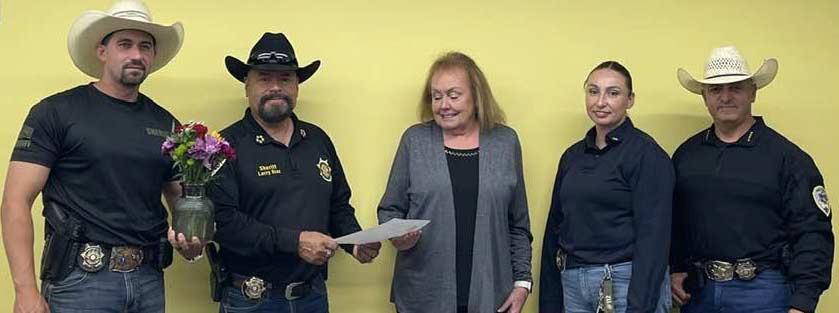 The Cibola County Sheriff’s Office honored Luann Elkins on June 18 for more than 30 years of service on the Crime Stoppers Board. Sheriff Larry D. Diaz presented Elkins with a letter of appreciation recognizing her longtime commitment to public safety and community service. Photo by Julie Junod