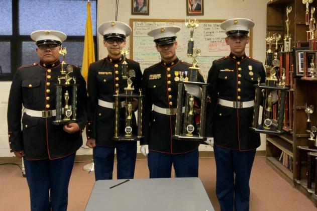 Corporal Christopher Werito (L), Corporal Brandon Garcia, Gunnery Sergeant Cameron Thompson, Sergeant Cayden Perry all pose for a photo after winning these awards at the State Competition this last school year. As the GHS MCJROTC comes back to full force, these students have high aspirations for the program, wanting to take the team back to the national championships. Diego Lopez - CC