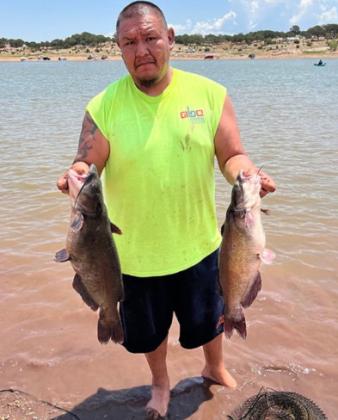 Jason Jackson caught two catfish using hot dogs on July 12. Courtesy Photo