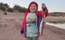 Adam Cheromiah, age 6, caught his first fish – a trout – using Garlic PowerBait on Feb. 25. Good fishing, Cheromiah! Courtesy of NM Game and Fish