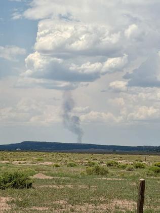 Smoke from the Four Mile Fire rises above the northwest Zuni Mountains as seen from the Bluewater Lake area on Aug. 10. The fire was reported Aug. 9 and had grown to approximately 10 acres by Monday evening. Photo By Kathy Helms