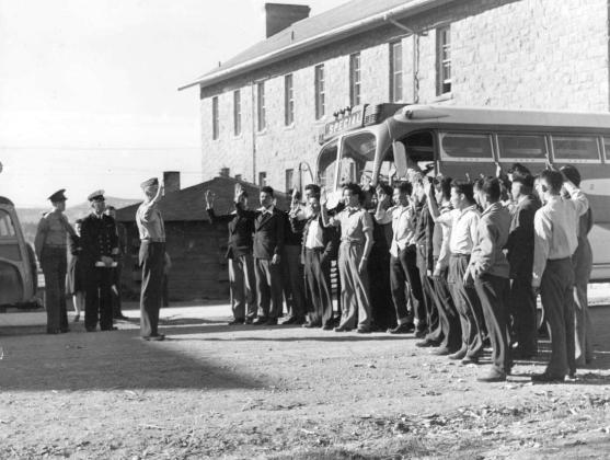 The first 29 Navajo recruits selected for the U.S. Marine Corps Code Talker program are sworn in at Fort Wingate on May 4, 1942. The Marines went on to develop a Navajo-based military code used to transmit vital battlefield communications during World War II. Navajo Code Talkers Day is observed Aug. 14. Courtesy of National Archives