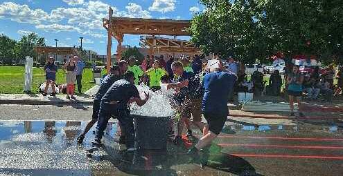 A water fight took place between the two lowest scoring teams, Ft. Lewis Mesa and Milan Fire. Arieanna Crowson - CC