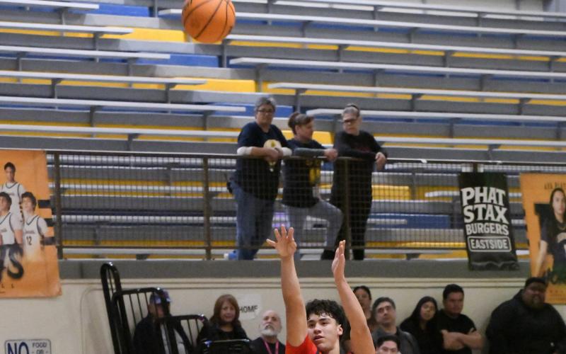Senior Coudy Melonas,2, of the GHS boys basketball team took one of his last shots as a high school senior last Saturday at Highland High School in the first round of the Nusenda 4A boys state basketball tournament. The Pirates lost that game to the number 1 ranked Hornets by a score of 76-31 ending this years season for them. The lady Pirates also lost their first round game by a score of 47-25 to the Hope Huskies. Franklin Romero - CC