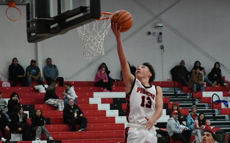 The Grants High School Boys and Girls basketball teams are nearing the end of district play in the next couple of weeks. In this file photo Daniel Garcia,13, of the GHS boys’ basketball team makes it look easy to get a lay-up in a recent home game. Franklin Romero - CC