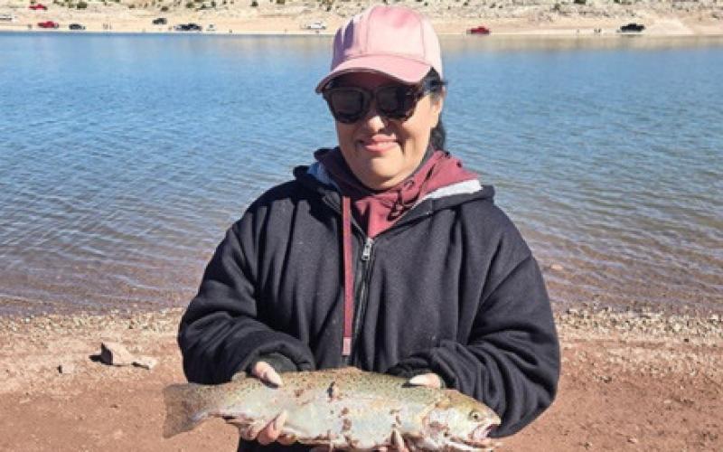 OraNell Mirabal caught five trout using homemade bait on March 7. “It was an amazing experience,” she said. “I’ve never caught a fish this big before.” Courtesy Photo