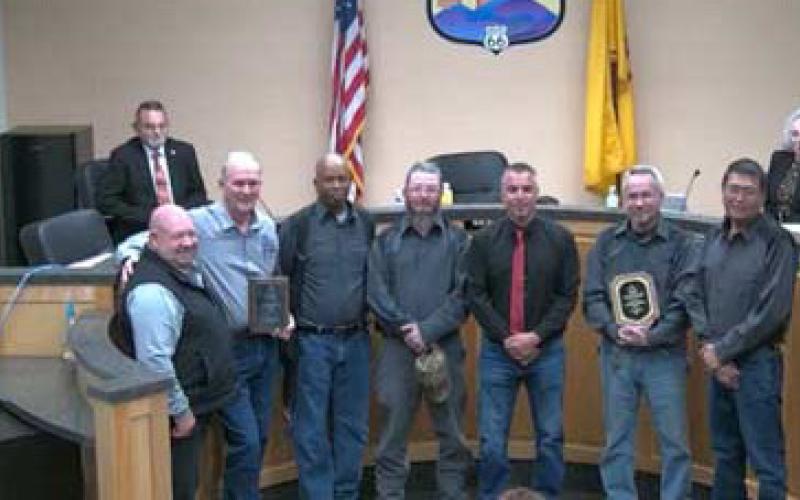 Left to Right: City Manager Andrew Valencia, Robert Hays, Alvin Dorsey, Felix Valdez, Mayor Garcia, Jack Frame, and Harrison Charley. Waste Water Treatment Plant awards recognition. City WWTPAward Courtesy Photo