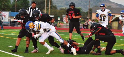 Pirates drubbed by Bobcats, 52-0